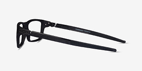 Oakley Currency Satin Black Plastique Montures de lunettes de vue d'EyeBuyDirect, Vue de Côté
